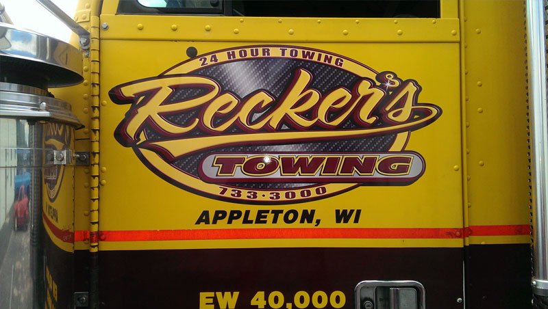 Car Towing by Recker’s Towing Service Tow Truck